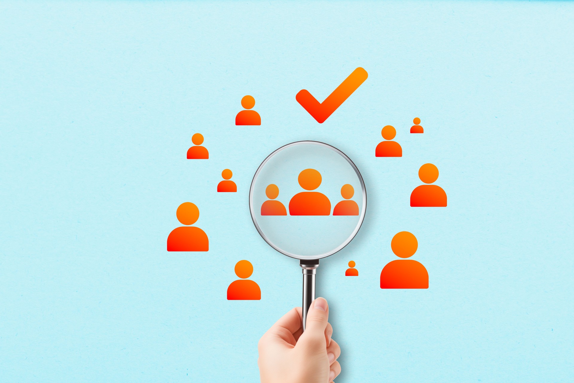 Customer Targeting and Selection Concept with Magnifying Glass and User Icons